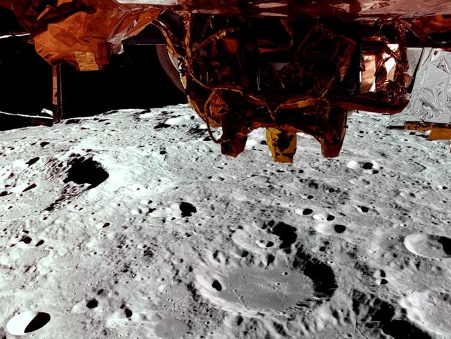 This still image taken from a February 24, 2025 video released by Firefly Aerospace shows Firefly's Blue Ghost lander on its third lunar orbit, showing the far side of the Moon and a top-down view of Blue Ghost. More than fifty years passed between the last Apollo mission and America's return to the lunar surface, when the first ever private lander touched down last February. Now, starting March 2, two more missions are set to follow within a single week -- marking a bold push by NASA and its industry partners to make Moon landings a routine part of space exploration. (Photo by Handout / Firefly Aerospace / AFP) / RESTRICTED TO EDITORIAL USE - MANDATORY CREDIT "AFP PHOTO / Firefly Aerospace" - NO MARKETING NO ADVERTISING CAMPAIGNS - DISTRIBUTED AS A SERVICE TO CLIENTS