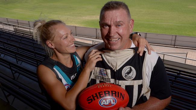 Erin with her dad, Greg, wearing Port Adelaide colours in 2015. Picture: Keryn Stevens