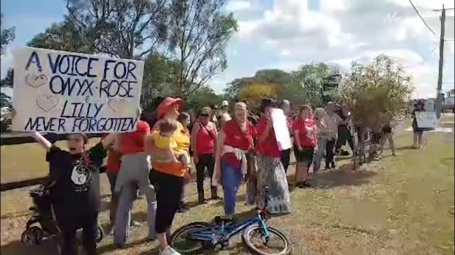 Families rally outside Beaudesert State High after student suicides