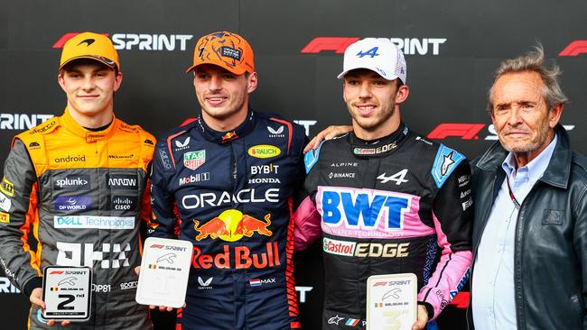 Sprint winner Max Verstappen (second from left), Second placed Oscar Piastri of Australia and McLaren (L), Third placed Pierre Gasly of France and Alpine F1 (second from right) and Jacky Ickx in Spa, Belgium. Picture: Getty Images