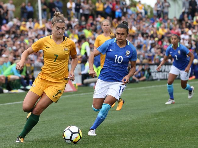 Steph Catley makes a run against Brazil.