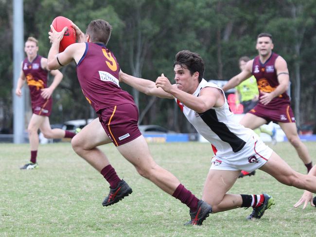 Round 5 of the QAFL Australian rules competition. Palm Beach Currumbin v Morningside at Salk Oval. PBC Player No9 Angus Munro Morningside Player No. Pic Mike Batterham