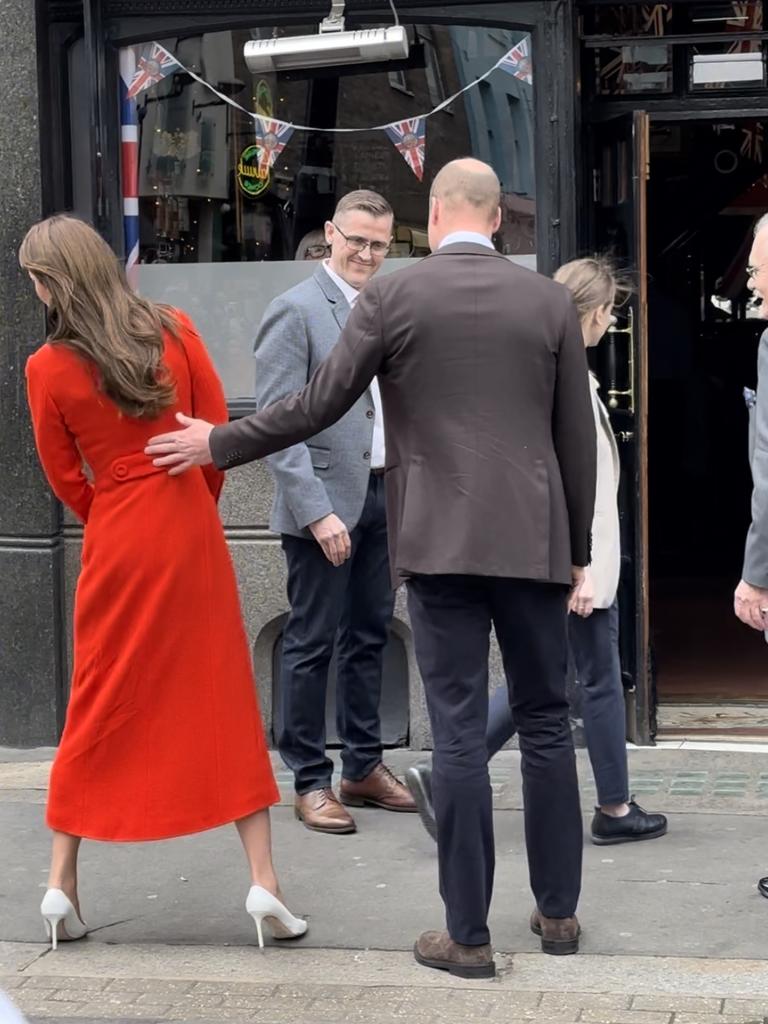 The Princess of Wales peered around the corner after their surprise visitor was moved on. Picture: Bronte Coy