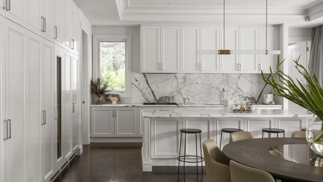 Two Calacatta marble kitchen’s make this Toorak luxe home shine.