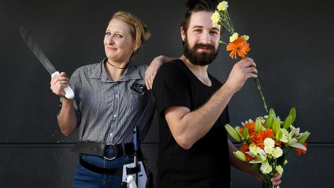 TAFE SA graduates Amber Hamann (Meat Studies) and Jake Chaplin (Floristry) are busting gender stereotypes. Picture: Tricia Watkinson