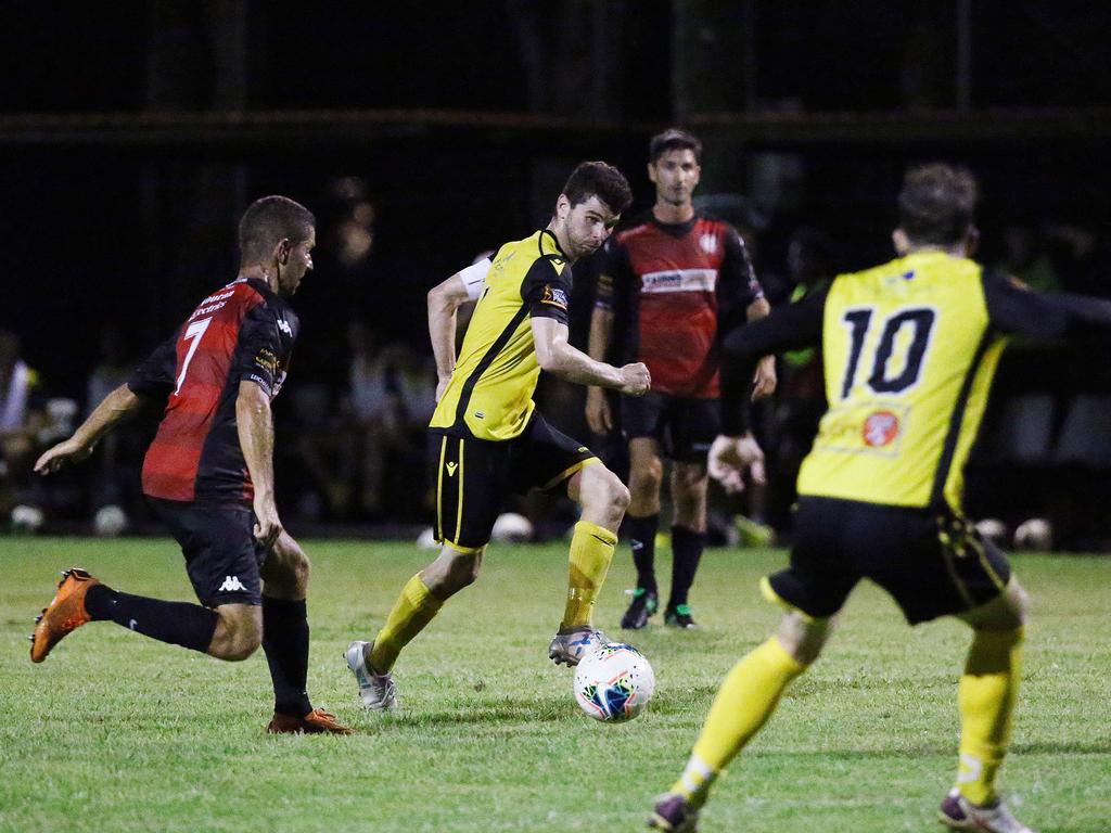 Tigers captain Josh De Nittis crosses to Crios O'Hare who scores a goal in the FNQ Premier League men's match between the Edge Hill Tigers and the Leichhardt Lions, held at Tiger Park, Maunda. Picture: Brendan Radke