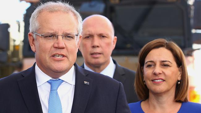 Prime Minister Scott Morrison (left) speaks to the media with Queensland state Opposition Leader Deb Frecklington (right) on a visit to Brisbane last year. Picture: Jono Searle