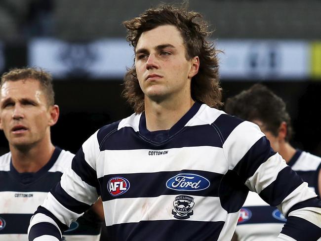 MELBOURNE, AUSTRALIA - APRIL 11: Jordan Clark of the Cats reacts after a loss during the 2021 AFL Round 04 match between the Melbourne Demons and the Geelong Cats at the Melbourne Cricket Ground on April 11, 2021 in Melbourne, Australia. (Photo by Dylan Burns/AFL Photos via Getty Images)