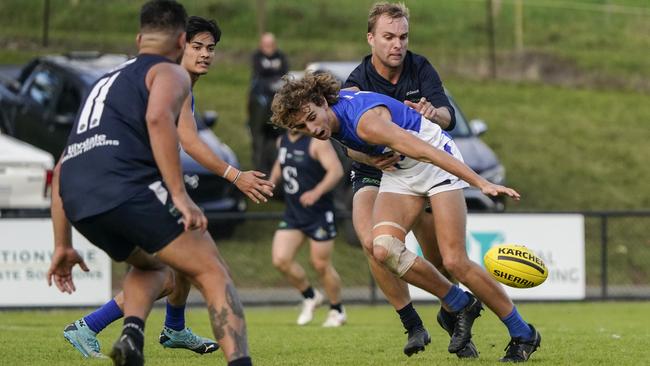 Officer’s Sam Hoghton over the ball. Picture: Valeriu Campan