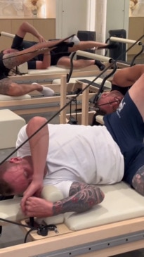 Tradies attempt reformer pilates in hilarious viral clip