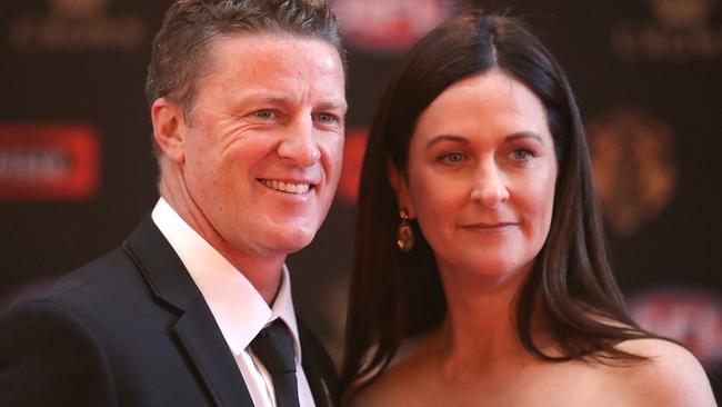 Damien Hardwick, coach of the Tigers and his wife Danielle Hardwick arrive ahead of the 2017 Brownlow Medal. Photo by Scott Barbour/Getty Images.