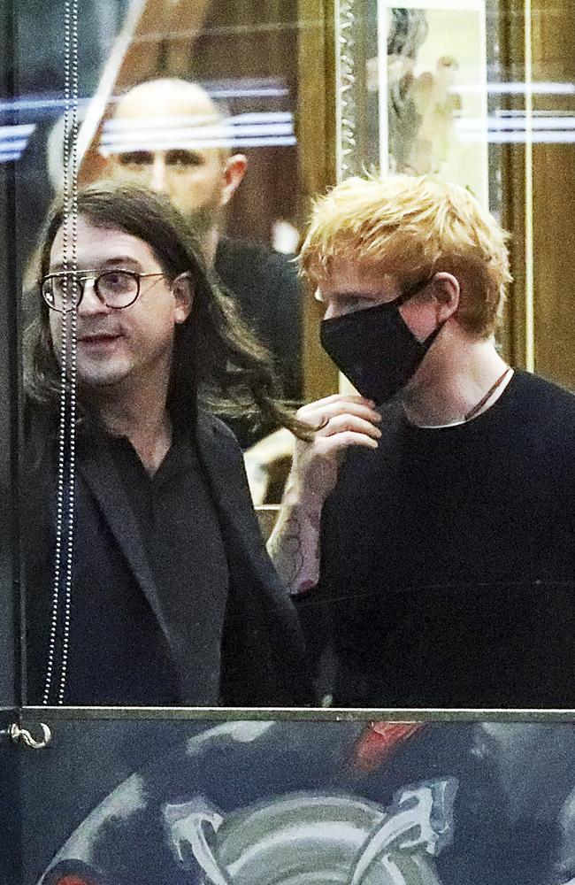 Sheeran and Gudinski at the Grey Street Tattoo Parlour. Picture: Media-mode.com