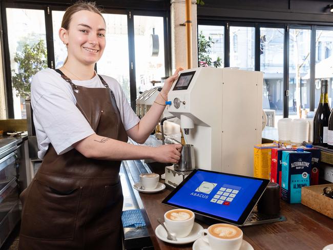 Maya Shepherd, 19, with a robot milk steamer at Abacus in South Yarra. Picture: Jason Edwards