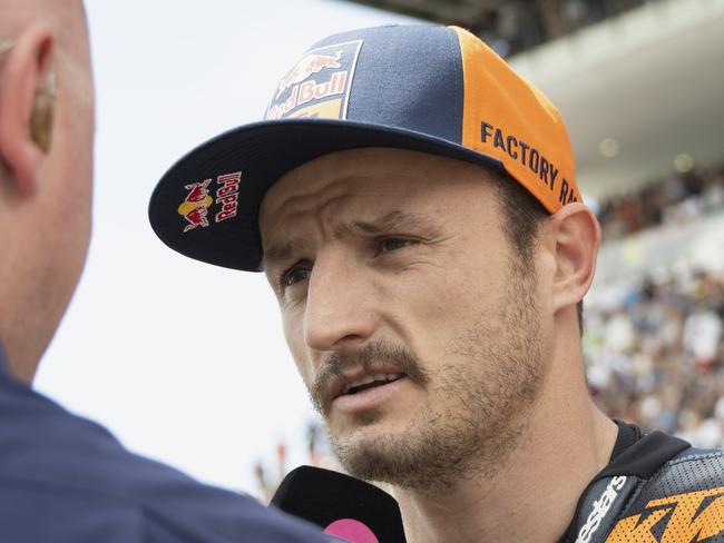 SCARPERIA, ITALY - JUNE 02: Jack Miller of Australia and Bull KTM Factory Racing speaks with journalist and prepares to start on the grid during the MotoGP race during the MotoGP Of Italy - Race at Mugello Circuit on June 02, 2024 in Scarperia, Italy. (Photo by Mirco Lazzari gp/Getty Images)