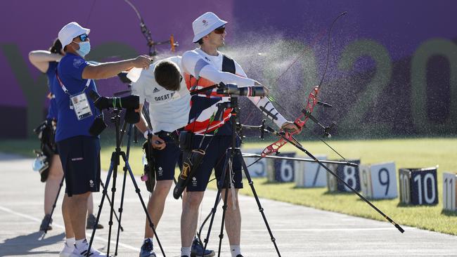 Archers practice at a training session at Yumenoshima Park Archery Field. Picture: Getty Images