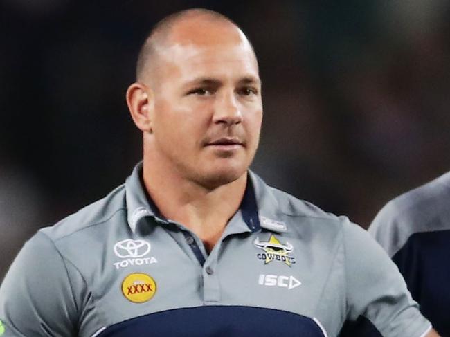 SYDNEY, AUSTRALIA - SEPTEMBER 23:  Injured Cowboys players Johnathan Thurston (L) and Matt Scott (R) assist Cowboys warm up during the NRL Preliminary Final match between the Sydney Roosters and the North Queensland Cowboys at Allianz Stadium on September 23, 2017 in Sydney, Australia.  (Photo by Matt King/Getty Images)