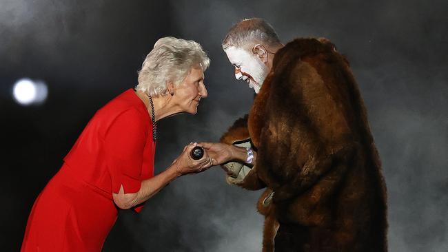 Commonwealth Games Federation Dame Louise Martin receives gifts of Indigenous Australians. Picture: Michael Klein