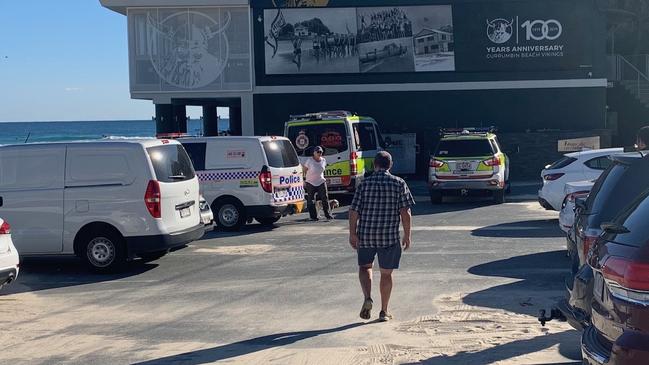 Emergency services near Currumbin surf club following a drowning on Friday morning. Picture: Greg Stolz