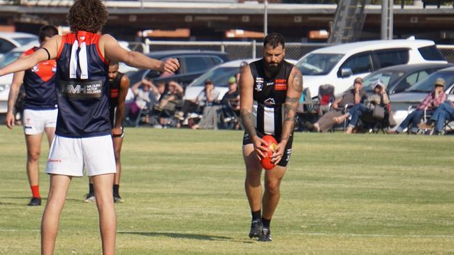 Michael Harradine lines up a shot for Merbein in the match against Mildura. Picture: Michael DiFabrizio