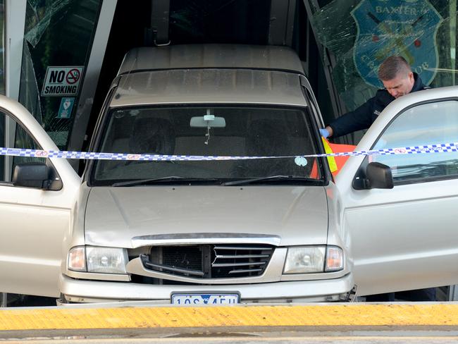 A stolen vehicle wedged in the entrance of Norm Parker Pavillion at Baxter Park, Frankston South. Picture: Andrew Henshaw