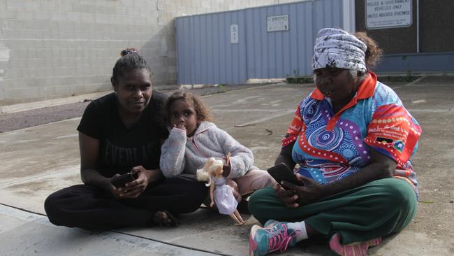 Samantha Woods, with her three-year-old daughter Janet and friend Jacqueline Bridley, is opposed to the cashless welfare card, as is Maureen Smart. Picture: Andrew Brooks