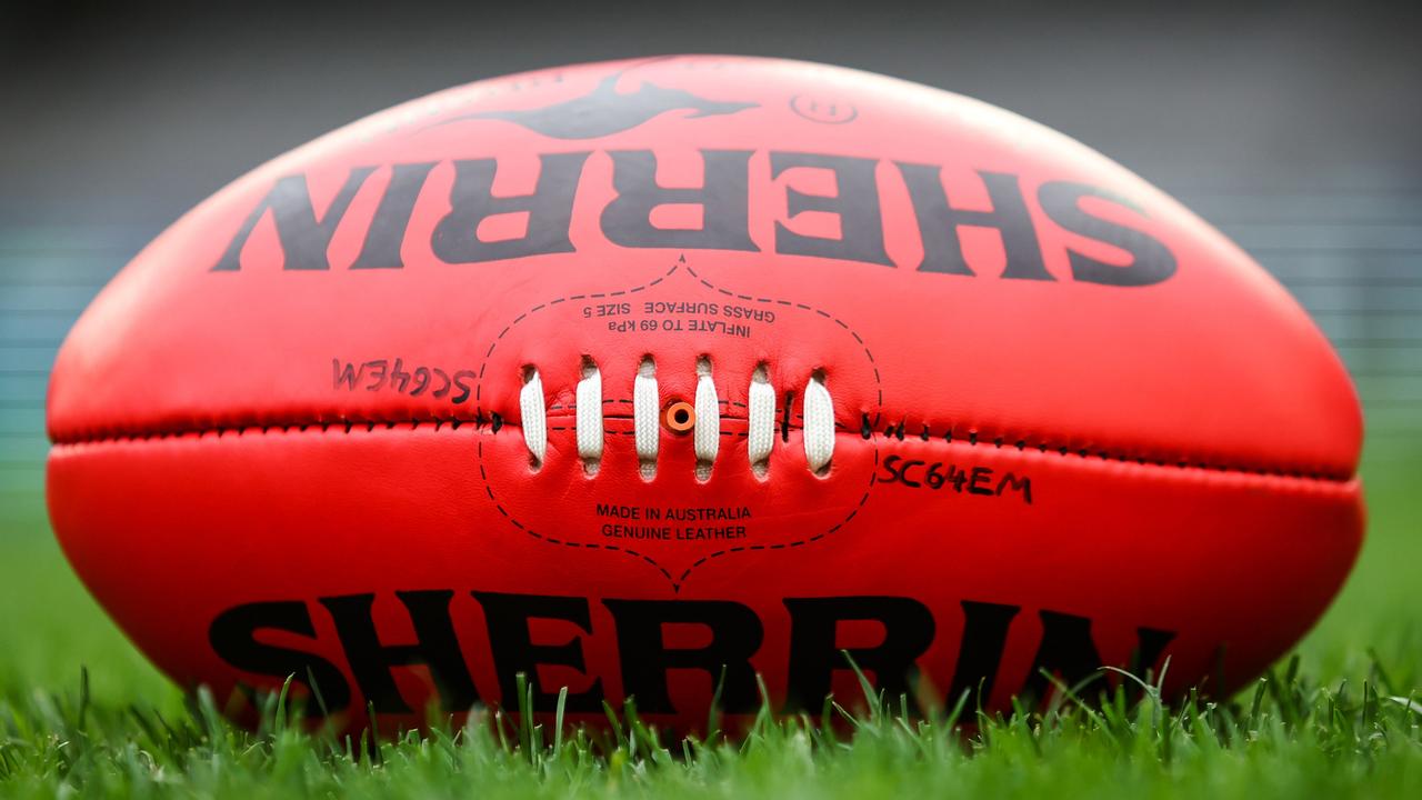 June 2023: the AFL continues to test microchip technology inside footballs. Tests are being conducted. A microchip is placed inside the Sherrin near the laces., Pictures: Supplied