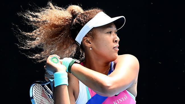 Naomi Osaka plays a backhand in her first round singles match against Camila Osorio. Picture: Getty Images