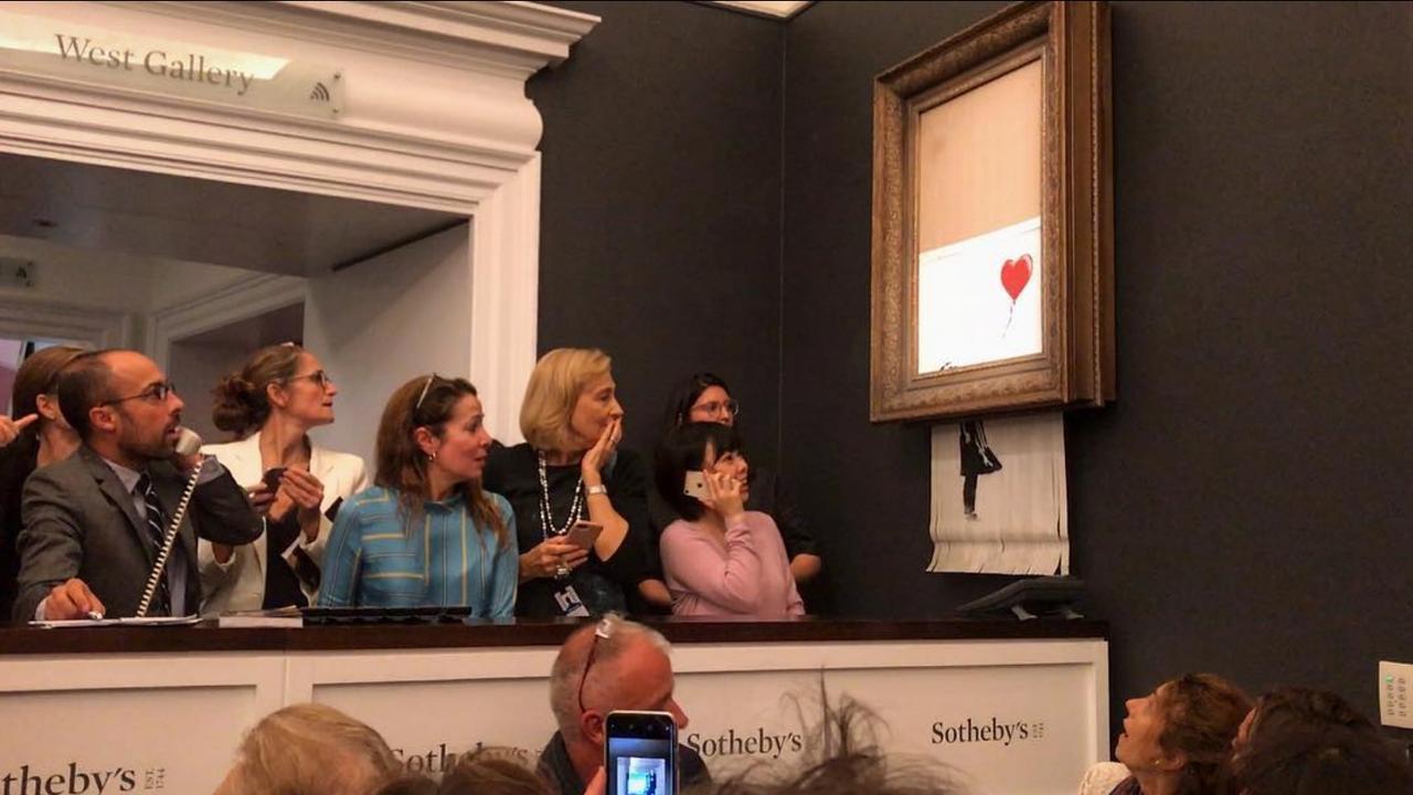 Banksy's Girl With Balloon (2006) self-destructed at the end of a Sotheby's auction. Picture: Instagram @banksy