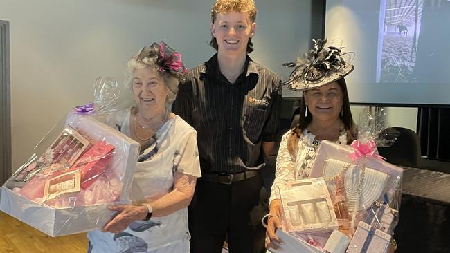 Best dressed winners Bobbie Kersten and Elizabeth O’Connor and RSL employee Blair celebrate race day at Penrith RSL