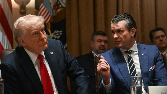 Donald Trump looks on as Secretary of Defence Pete Hegseth speaks during a cabinet meeting. Picture: AFP.