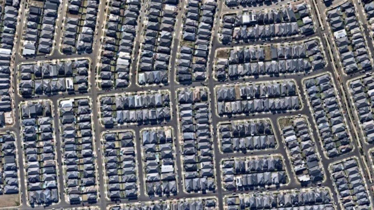 The aerial image of Western Sydney from NearMap shows how dominant dark roof colours are.