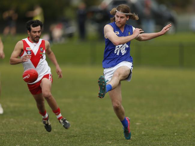 Patrick Wilson kicks Hastings forward.