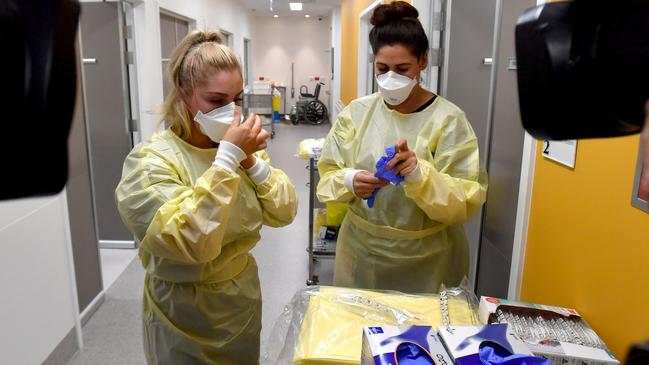 Registered nurses Chenae Spencer-Attard and Stephanie Kipirtoglou at the Coronavirus testing clinic at at the RAH. Picture: AAP / Sam Wundke