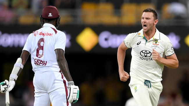 Josh Hazlewood of Australia reacts after removing West Indies batter Alzarri Joseph with the final ball of day one of the second Test. Picture: Getty Images