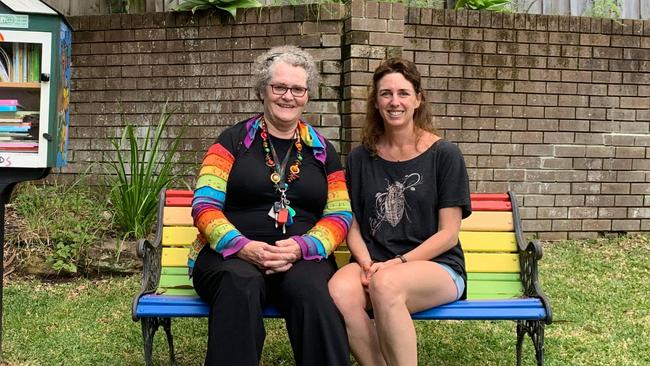 Resident Andy Bloom (right) pictured outside her home alongside a fellow resident.