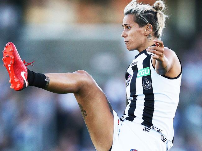 MELBOURNE, AUSTRALIA - FEBRUARY 02:  Moana Hope of the Magpies kicks the ball during the round one AFLW match between the Carlton Blues and the Collingwood Magpies at Ikon Park on February 2, 2018 in Melbourne, Australia.  (Photo by Michael Dodge/Getty Images)