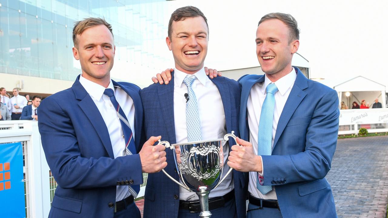 Ben Hayes (centre) with brothers Will and JD. Picture: Vince Caligiuri/Getty Images