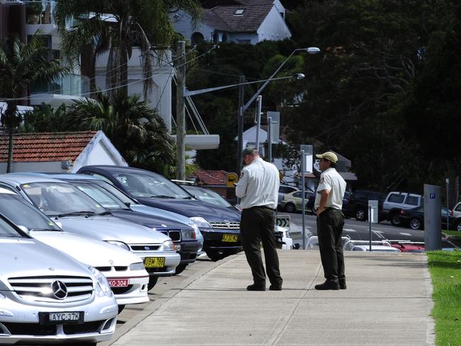 Council rangers, photographed in 2010, monitor parking at Balmoral Beach when the parking ticket machines were new.