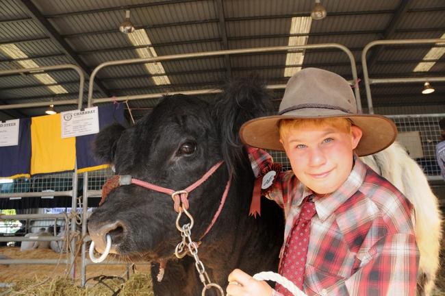Ransome Torrielli with Allaru Rising Star, a mini-galloway (stud feature breed). Picture: Renee Pilcher