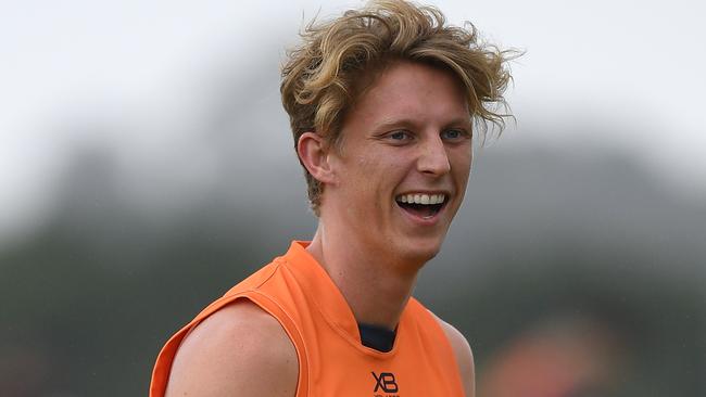 The SuperCoach Investor says Lachie Whitfield should be in your defence ‘at all costs’. Picture: AAP Image/Dan Himbrechts.