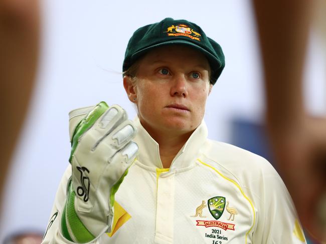 GOLD COAST, AUSTRALIA - SEPTEMBER 30: Alyssa Healy of Australia looks on during day one of the Women's International Test match between Australia and India at Metricon Stadium on September 30, 2021 in Gold Coast, Australia. (Photo by Chris Hyde/Getty Images)