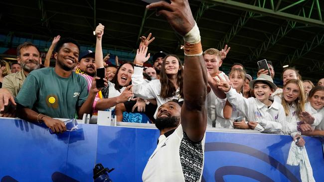 Fiji captain Waisea Nayacalevu takes a selfie with fans after his side’s win over Australia. Picture: AFP