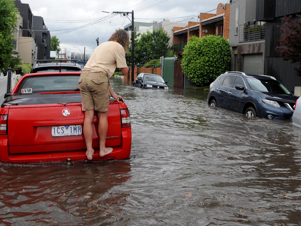 Glass Street in Richmond floods after heavy rains. Picture: Andrew Henshaw