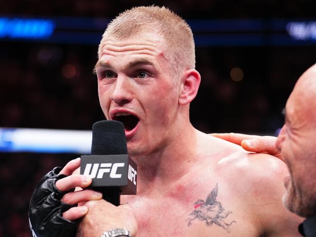 ANAHEIM, CALIFORNIA - FEBRUARY 17: Ian Garry of Ireland reacts after his split-decision victory against Geoff Neal in a welterweight fight during the UFC 298 event at Honda Center on February 17, 2024 in Anaheim, California. (Photo by Chris Unger/Zuffa LLC via Getty Images)