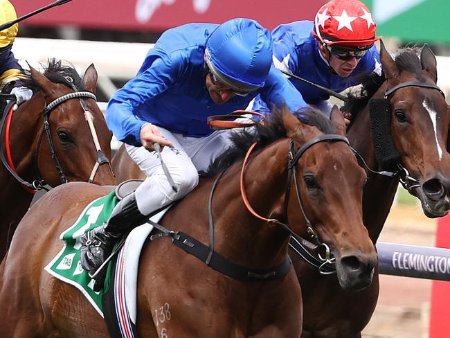 MELBOURNE. . Victoria Derby Day at Flemington racecourse. 30/10/2021.  Race 5. The Empire Rose Stakes. Colette ridden by Damien Oliver charges to line to win the group 1 Empire Rose Stakes   .  Photo by Michael Klein.