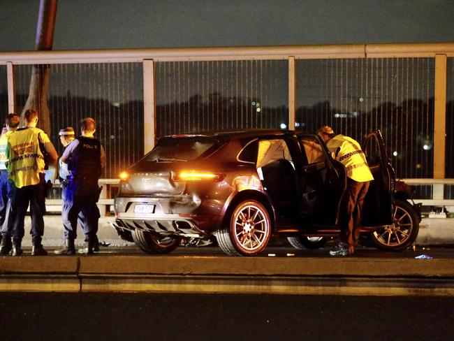 Police collect evidence. Picture: Steve Tyson