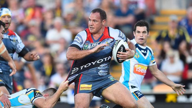 An intimidating Matt Scott makes a charge up the field against the Titans.