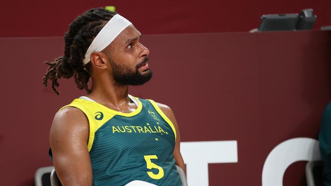 SAITAMA, JAPAN - AUGUST 05: Patty Mills #5 of Team Australia reacts in disappointment during the second half of a Men's Basketball quarterfinals game between Team United States and Team Australia on day thirteen of the Tokyo 2020 Olympic Games at Saitama Super Arena on August 05, 2021 in Saitama, Japan. (Photo by Kevin C. Cox/Getty Images)