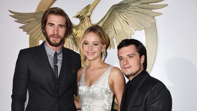 Josh Hutcherson says he would 100 per cent reunite with his Hunger Games stars Liam Hemsworth and Jennifer Lawrence. Picture: Kevin Winter/Getty Images