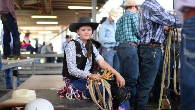 Sharlette Johnson, 16, the only female to compete in the junior bullride event, in action at the Mount Isa Mines Rodeo on Friday. Picture: Dan Peled/Getty Images